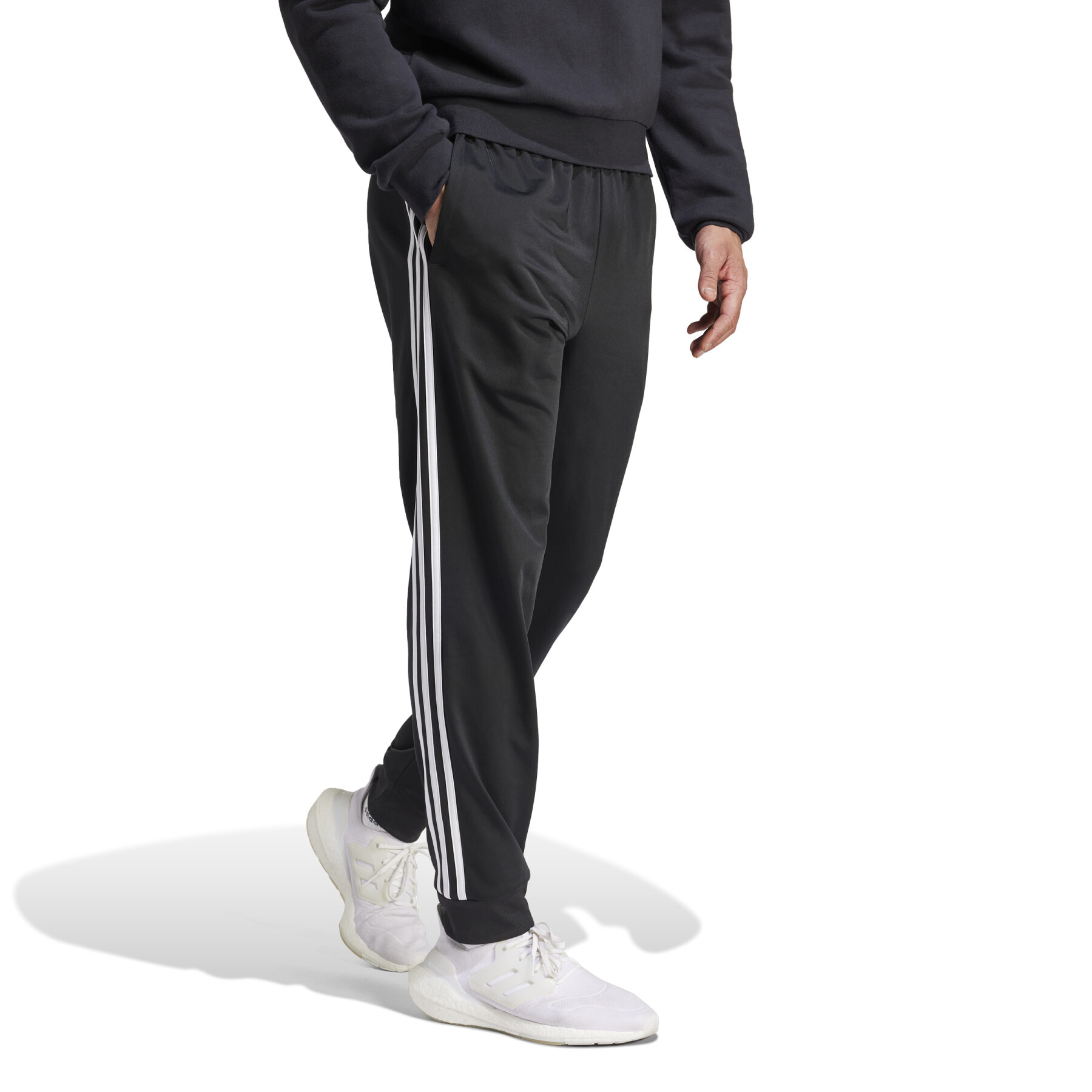 Spodnie dresowe adidas Primegreen Essentials Warm-Up zwężane 3-Stripes